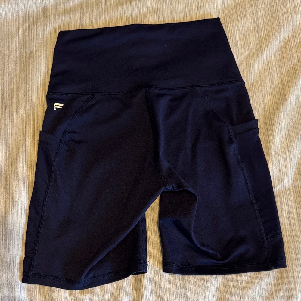 Fabletics Powerhold High-Waist women’s biker Shorts with Side Pockets